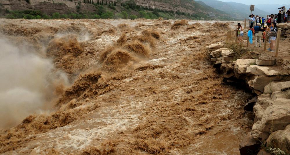 The Weekend Leader - Nearly 55,000 people evacuated as heavy rain lashes China's Shanxi